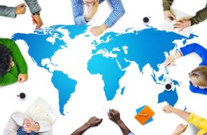 people at an image of the globe